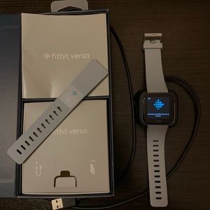 LIKE NEW Fitbit Versa